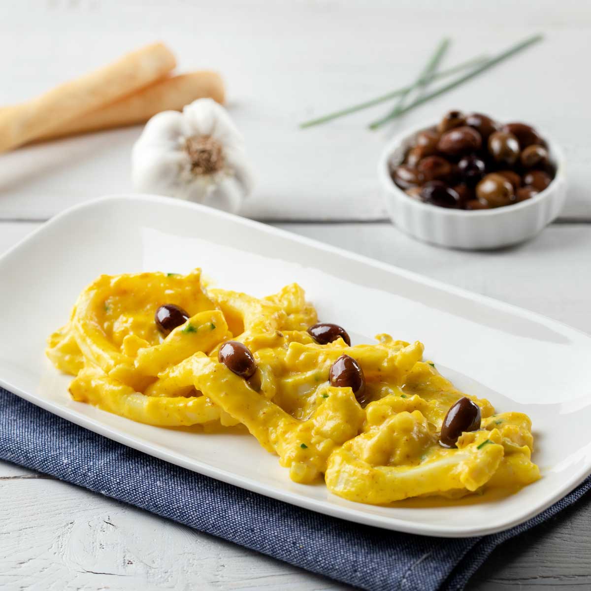 Anelli di seppia in salsa allo zafferano